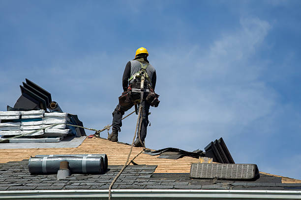 Professional Roofing technician working in East Livermore, ME